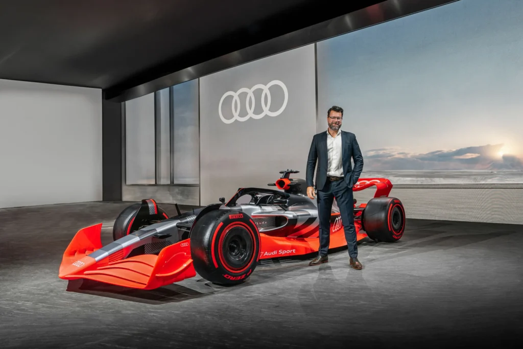 Image of an Audi Formula 1 car showcased at an event, highlighting the role of video marketing in promoting automotive excellence.