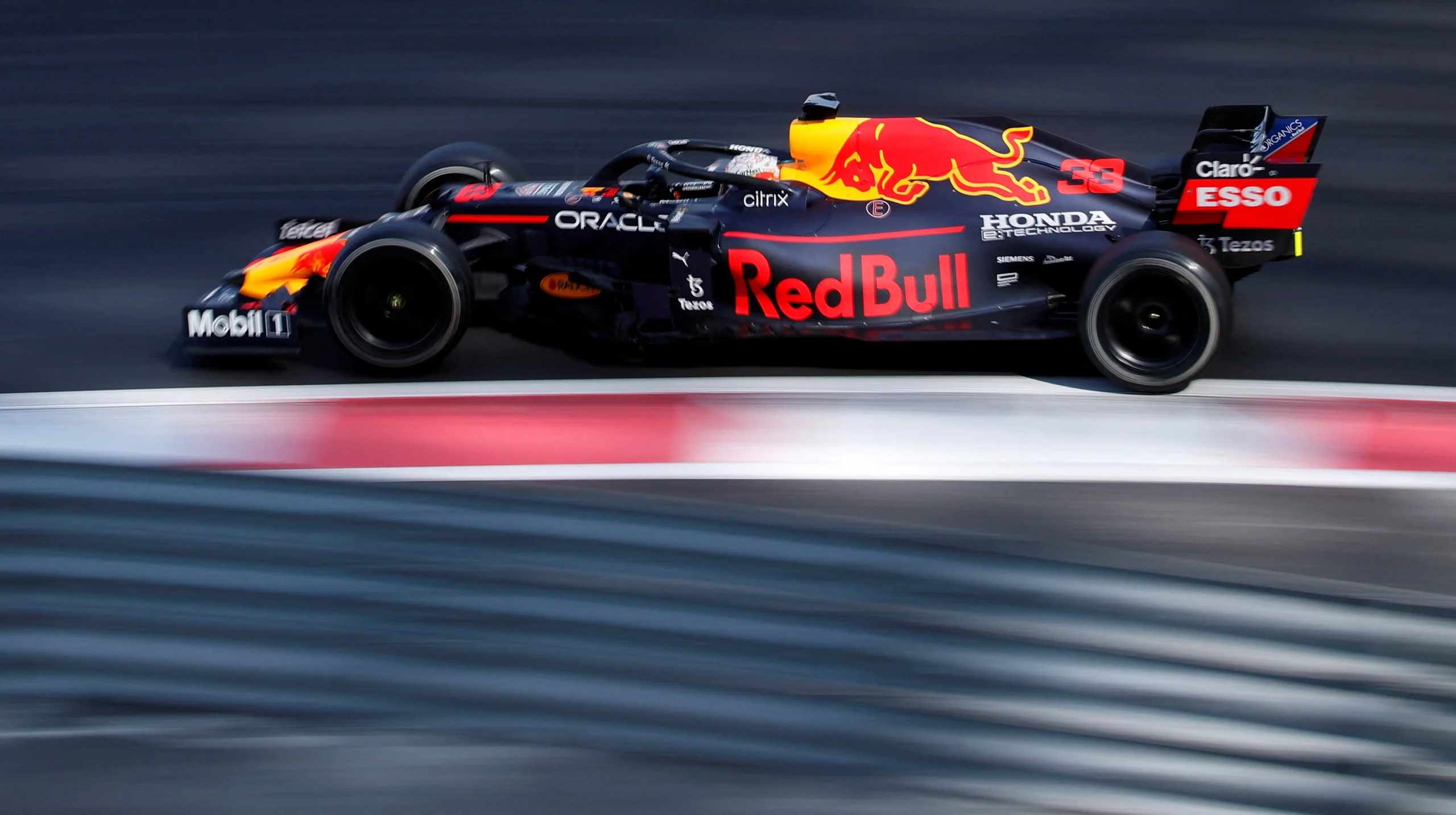 Image of a Red Bull Formula 1 car racing on the track, highlighting the synergy between speed and video marketing.